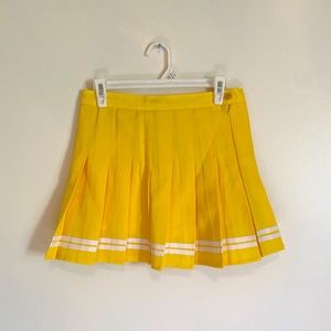 Super cute yellow tennis mini skirt